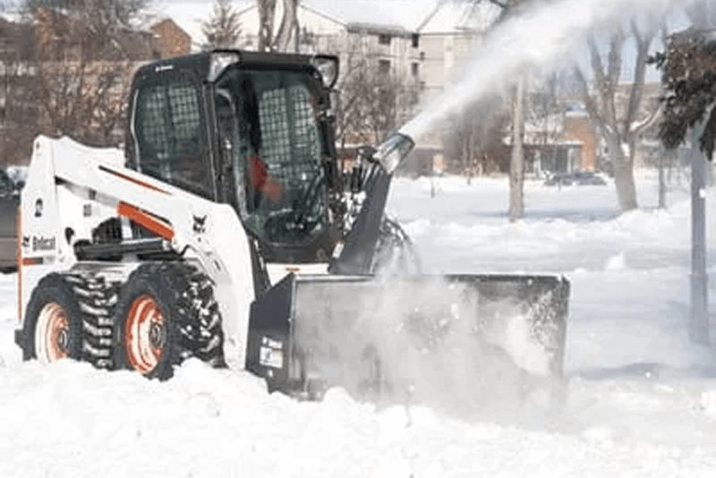 Skid steer snow removal attachments