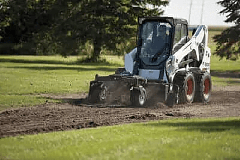 Skid steer soil conditioner attachments